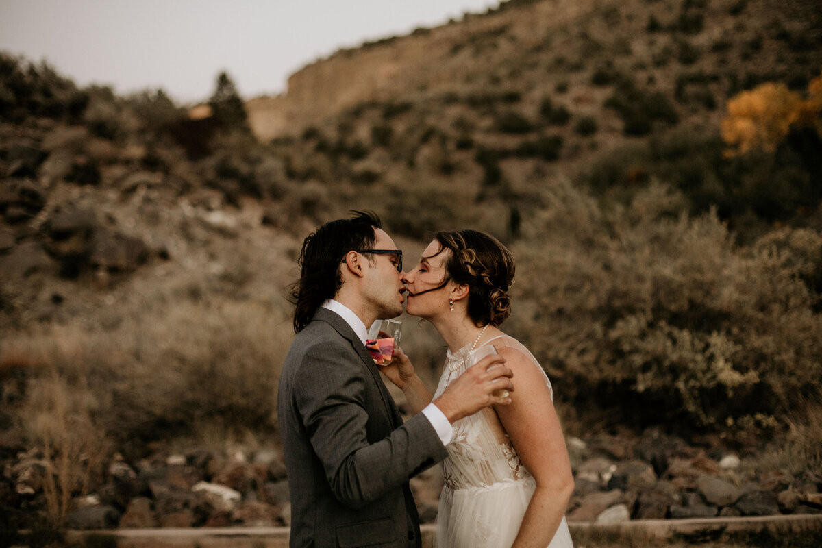bride and groom kissing in New Mexico