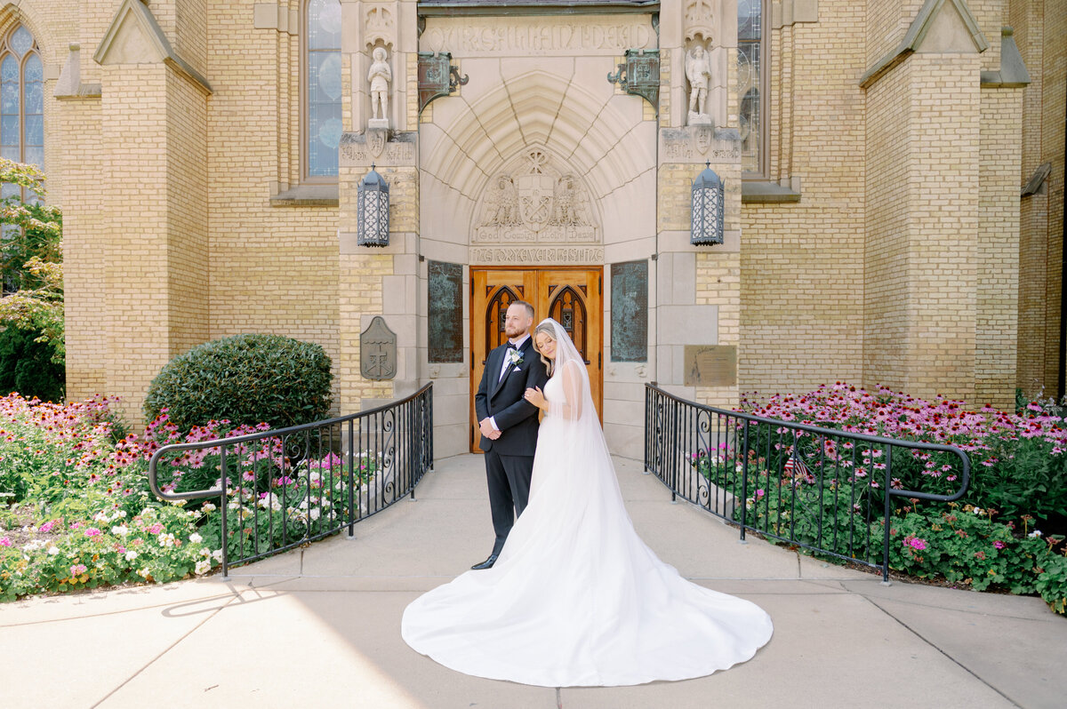 husband and wife embracing on their wedding day