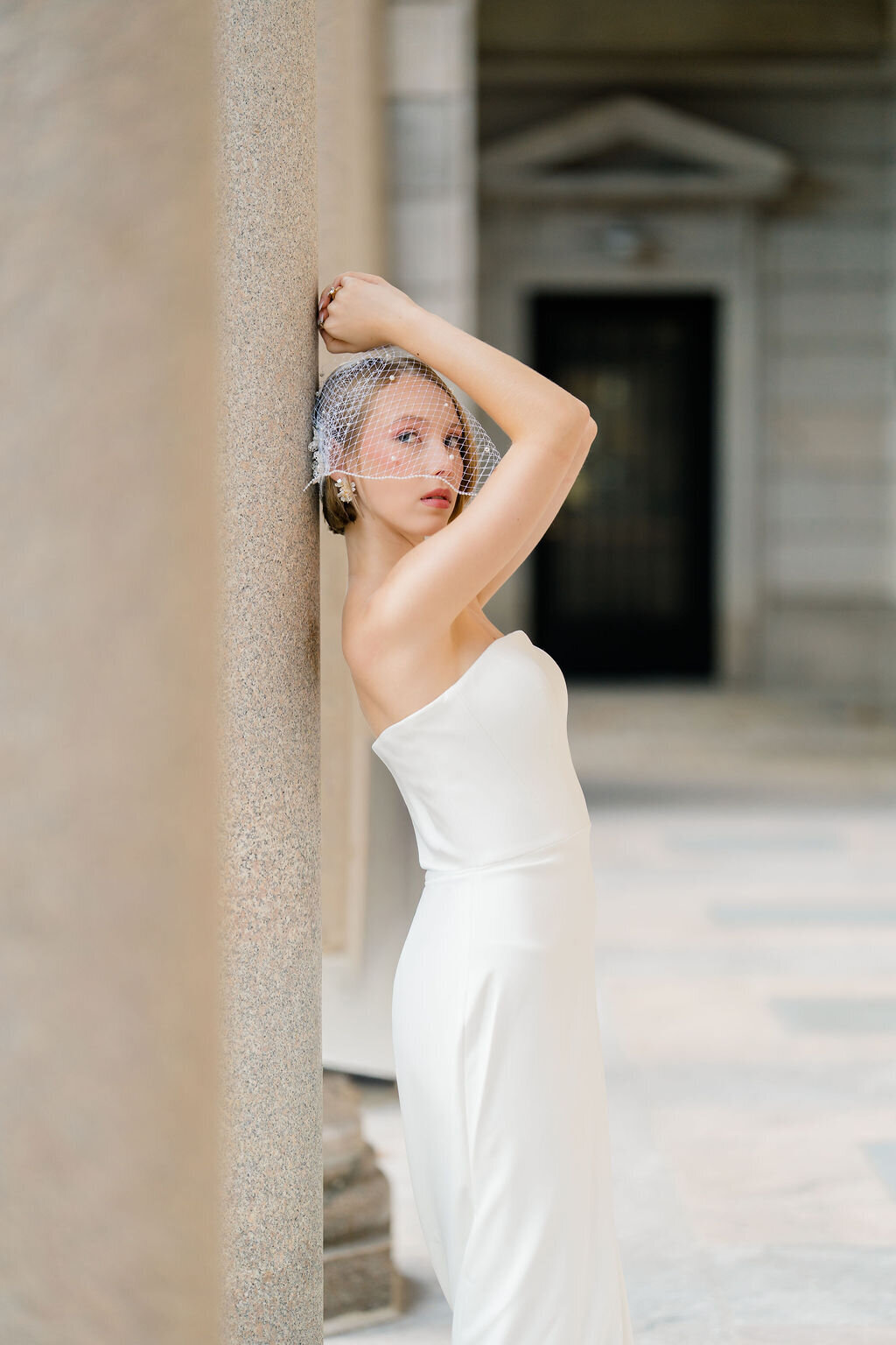Vintage inspired bridal birdcage veil adding a timeless touch to a modern bride
