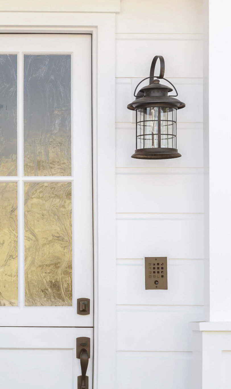 west-south-white-siding-black-lantern-dutch-door-old-glass tall