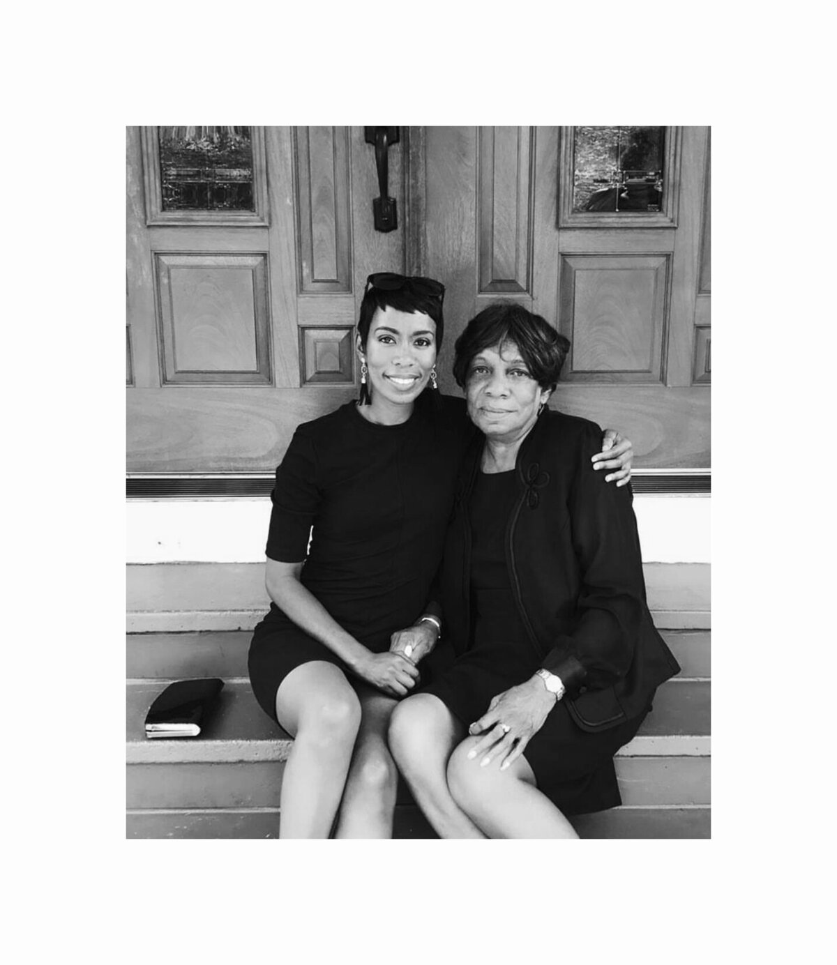 aunt and niece outside the doors of a black church in alabama