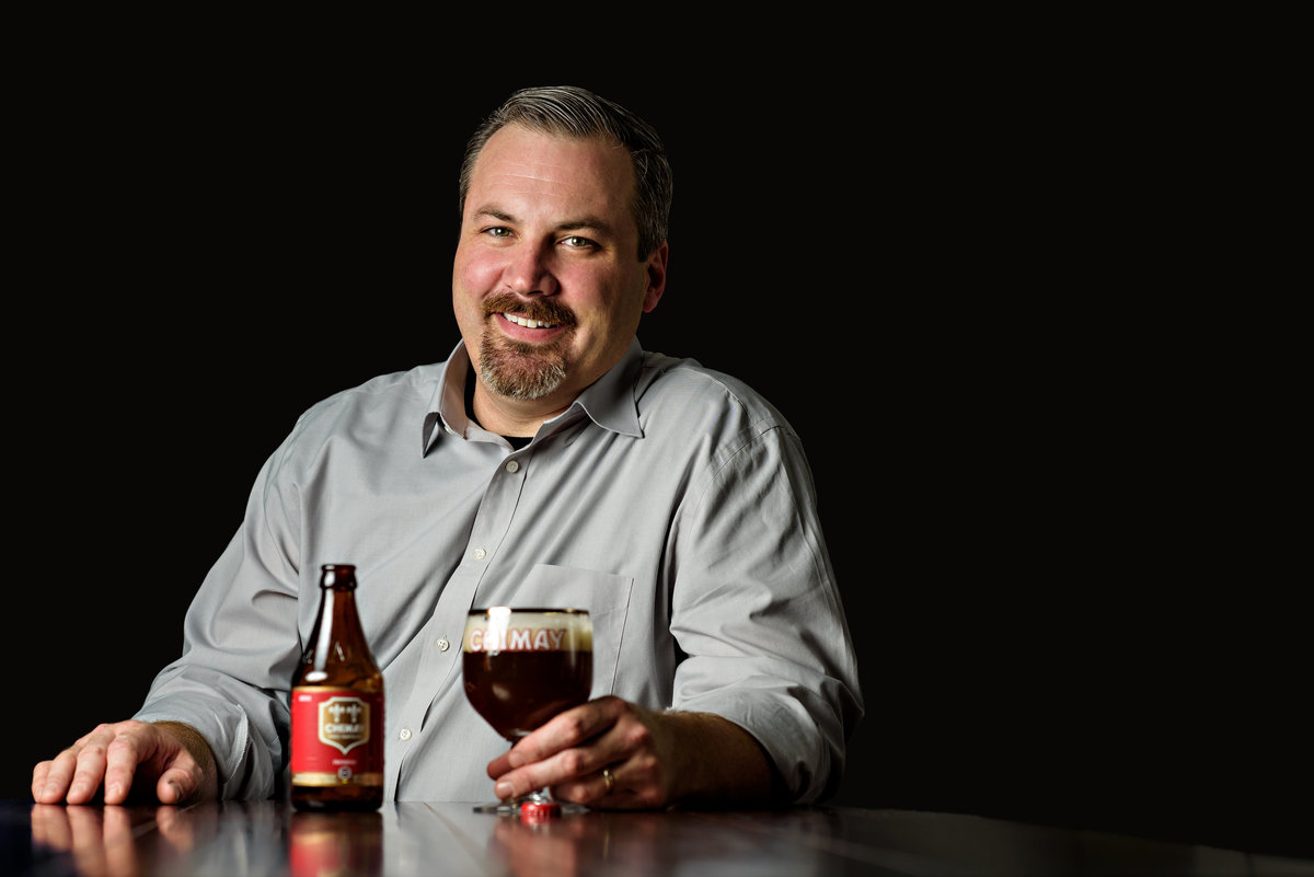 A head shot of a beer brewmaster.