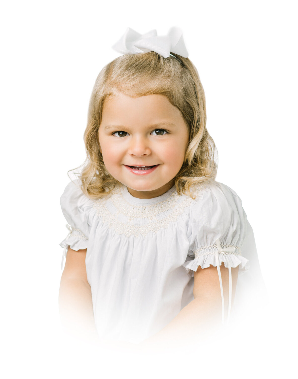 Girl with white bow in hair  seated on a chair for a heirloom portrait