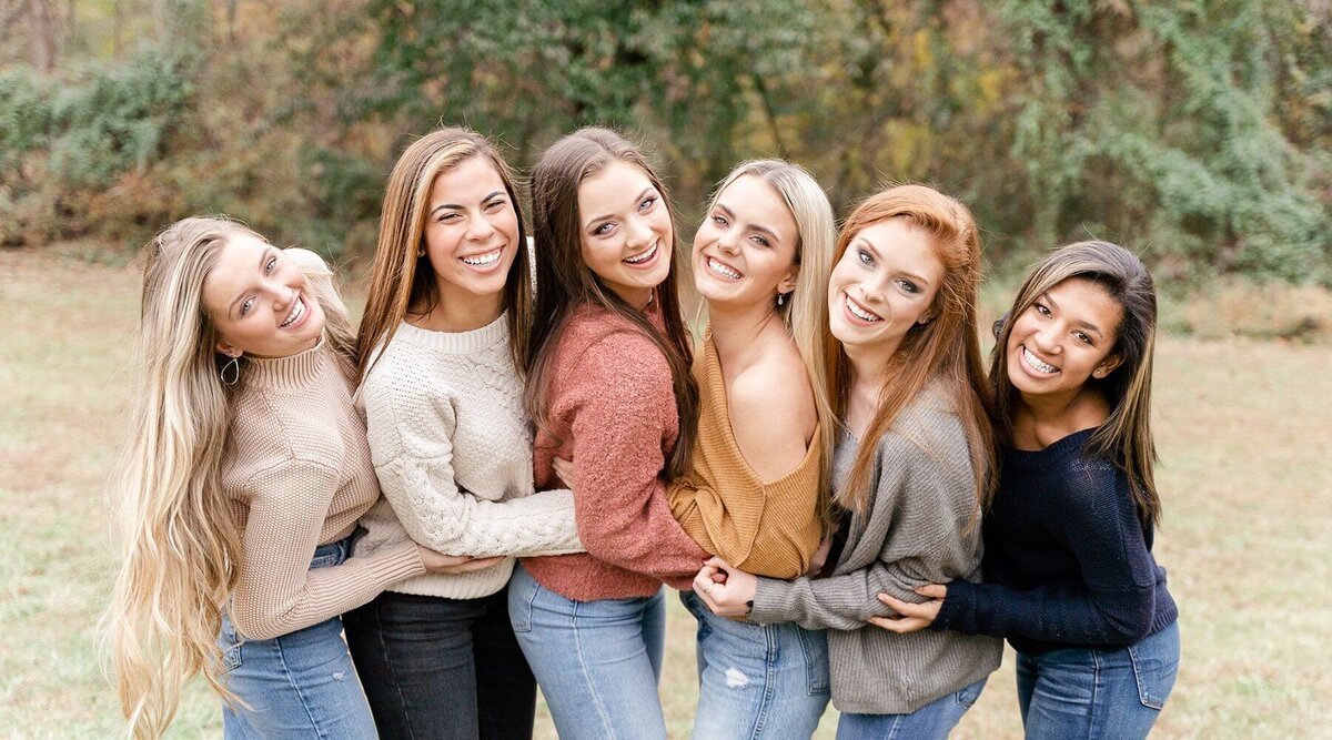 group of girls laughing taken by a senior photographer in Northern Virginia