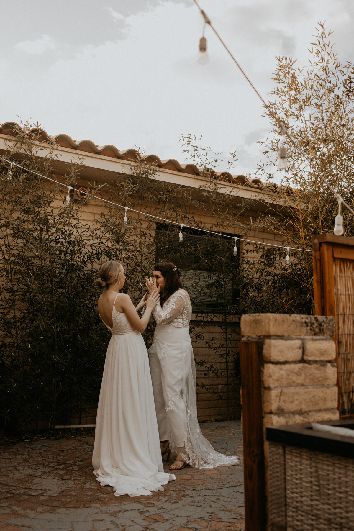 two brides first look before their ceremony, seeing each other for the first time
