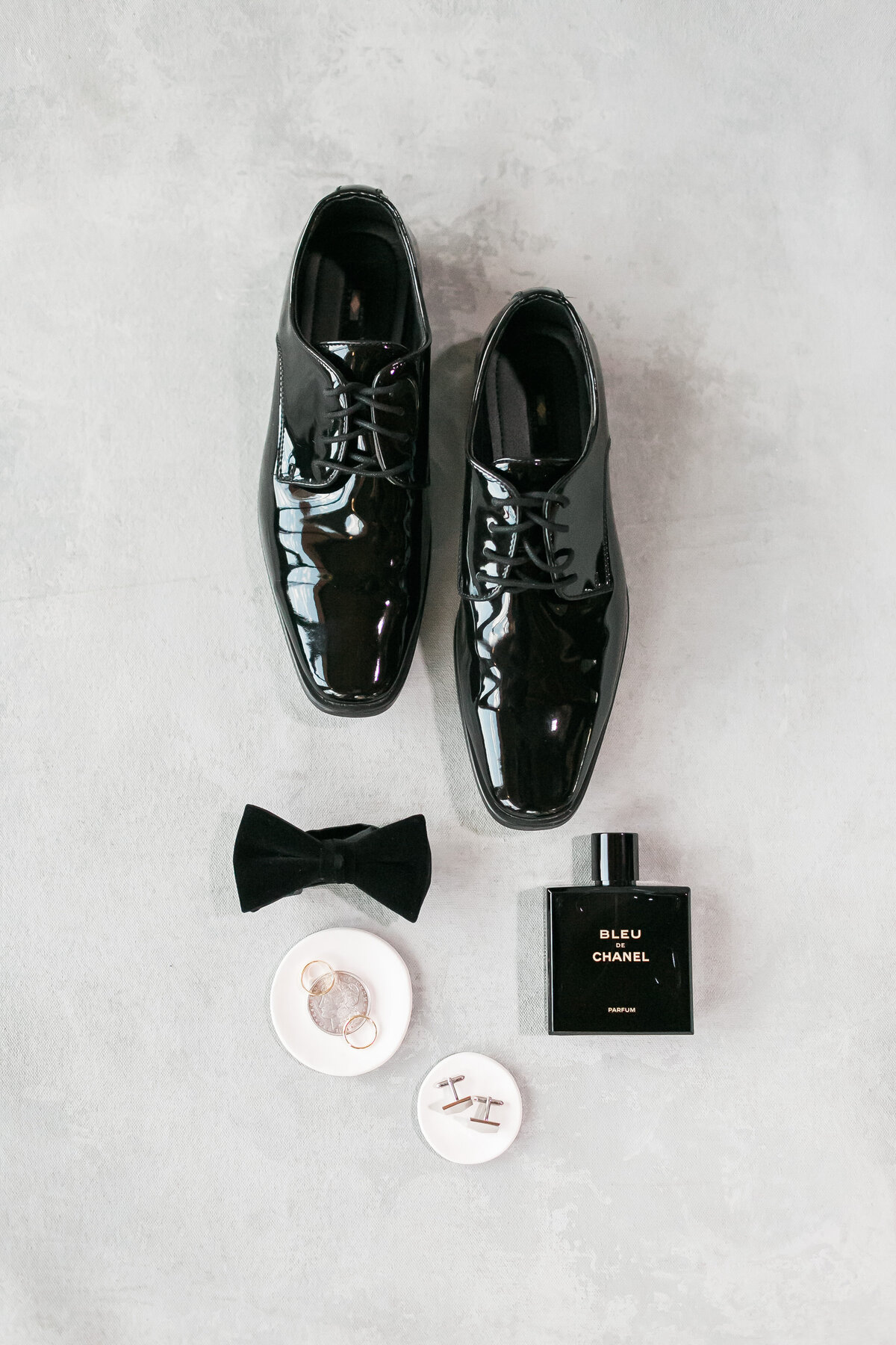 Close up of groom's wedding day accessories