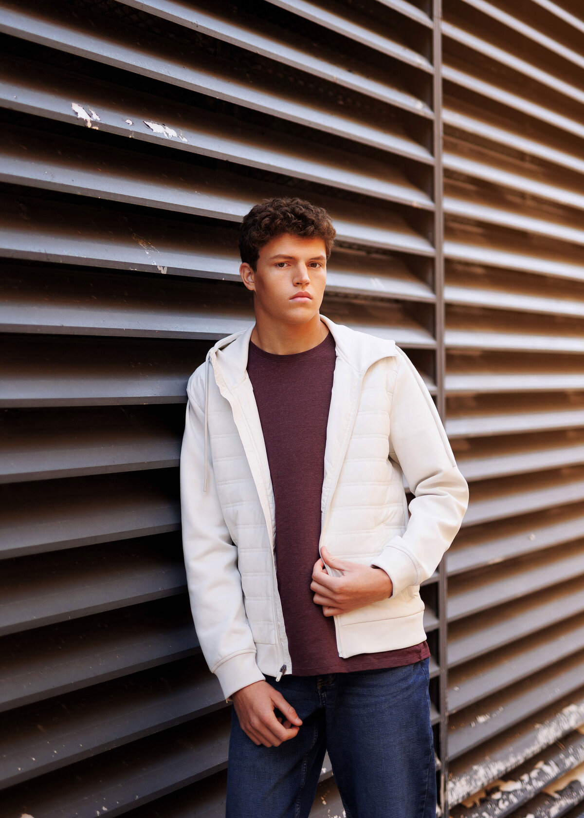 Senior Guy in Minneapolis Alleyway with confident serious expression