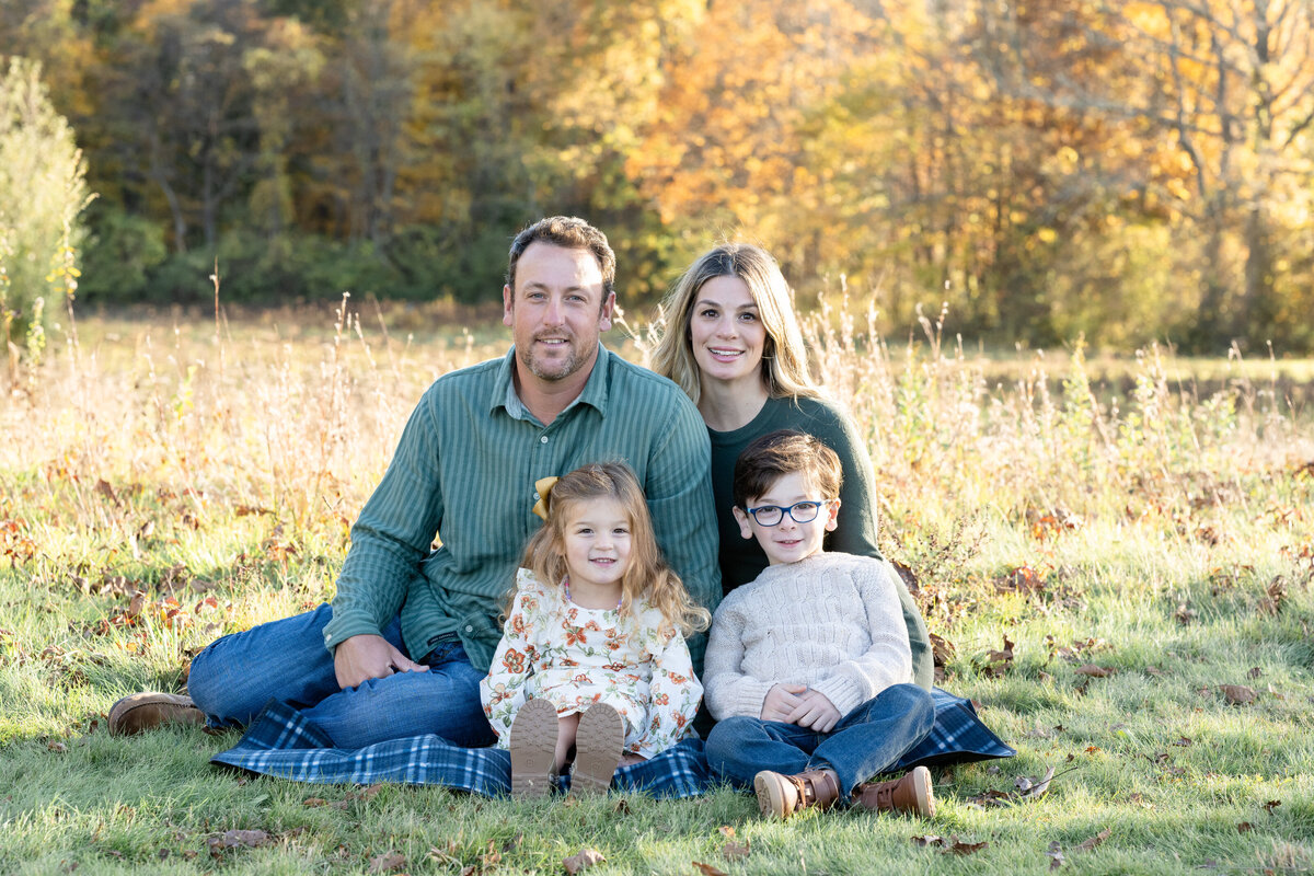 Portrait of young family in the fall in New Canaan, CT