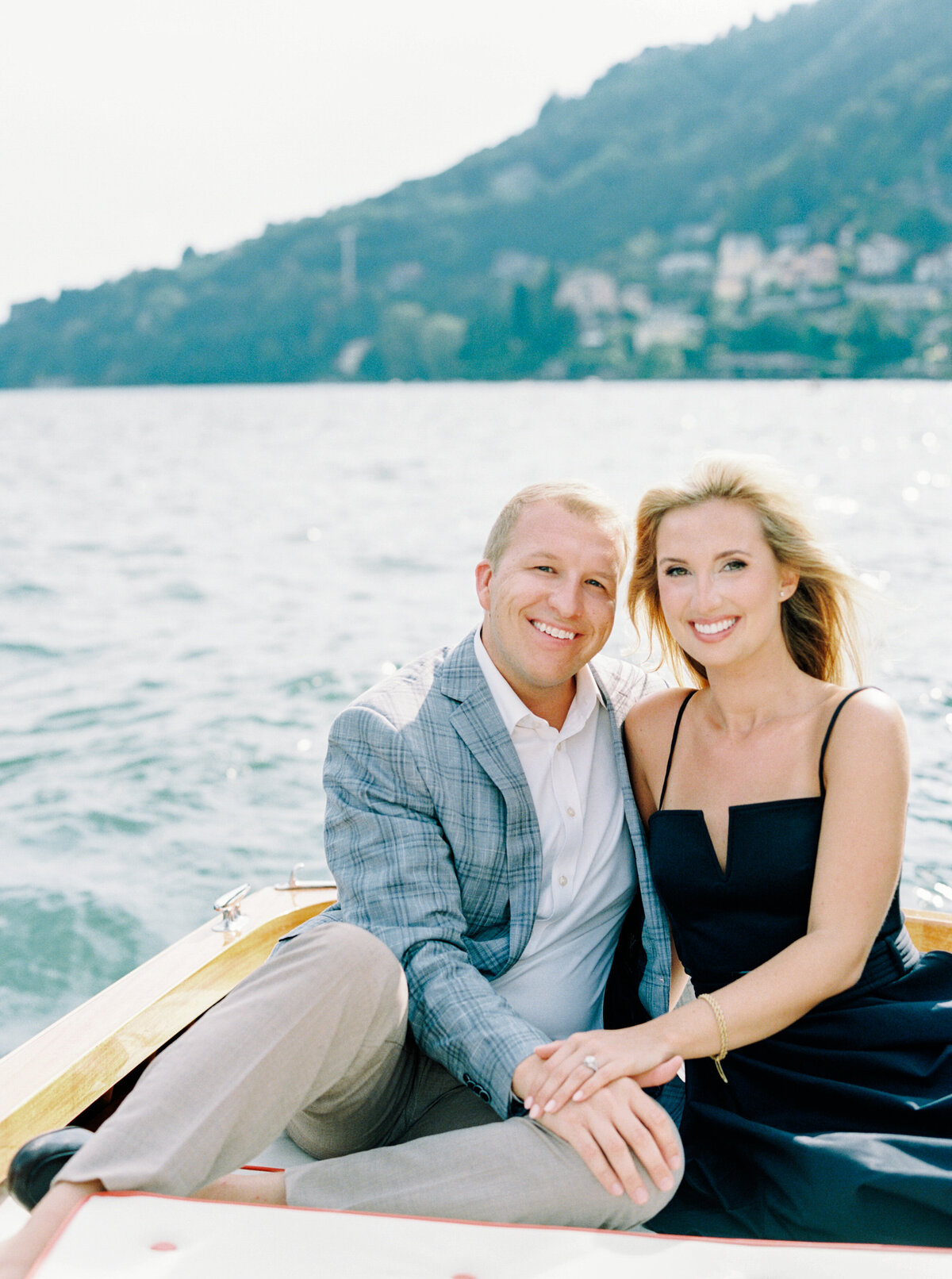 Film photograph engagement session on wooden boat on Lake Como Italy