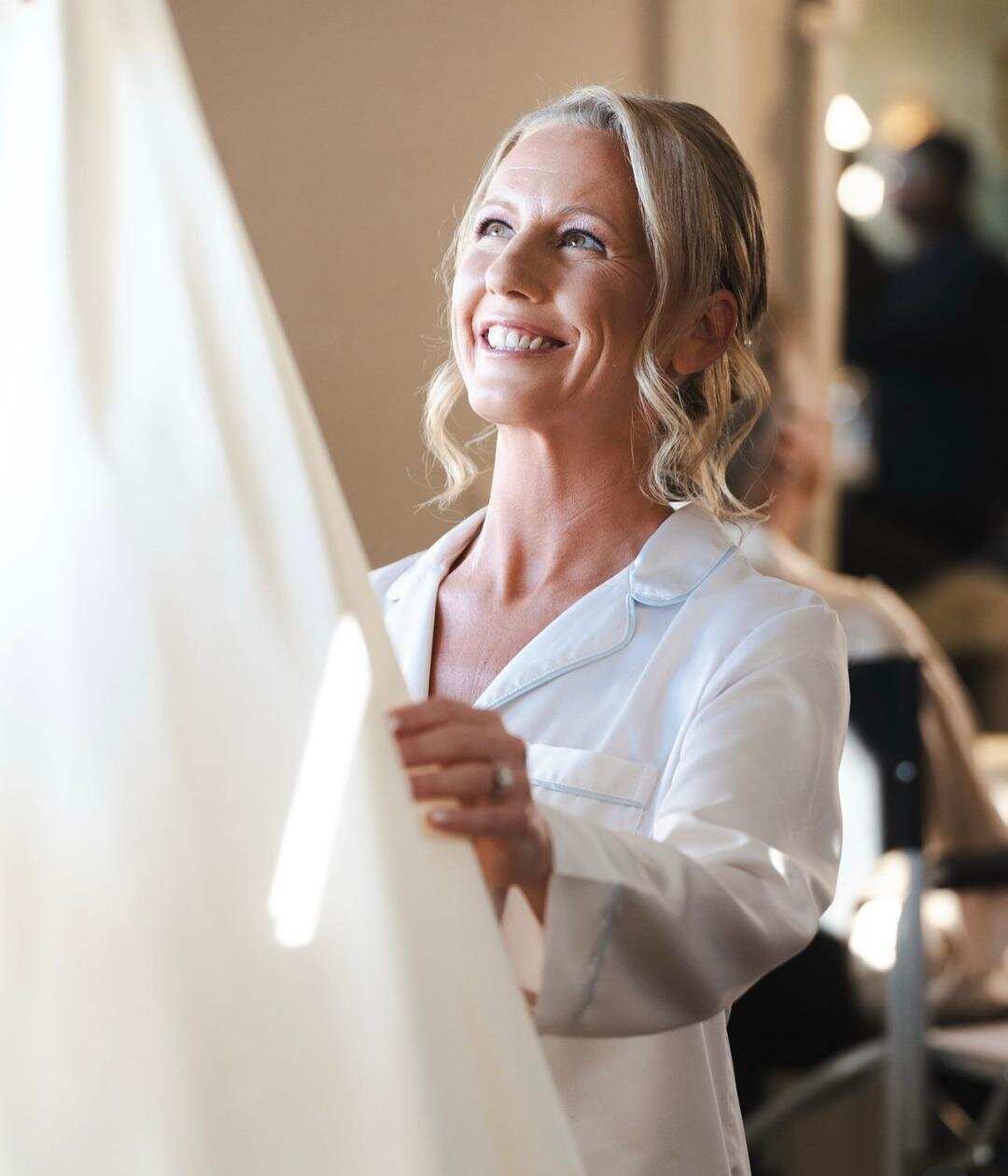 bride looking at herdress