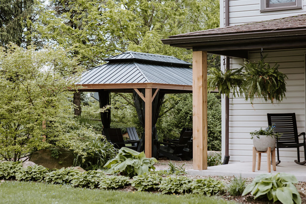 the outdoor pergola with firepit beside the modern farmhouse overnight accommodations at Willowbrook wedding venue