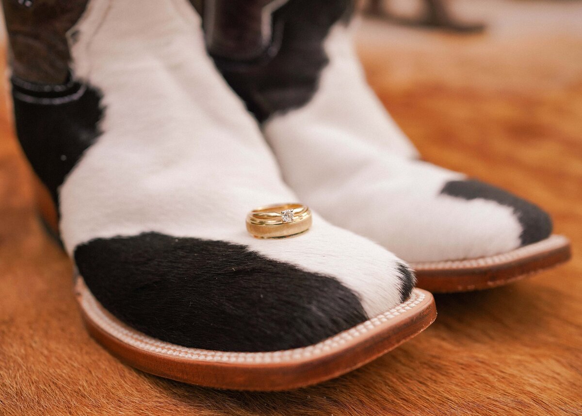pink-fox-photography-luxury-western-wedding-cowboy-boots-wedding-rings