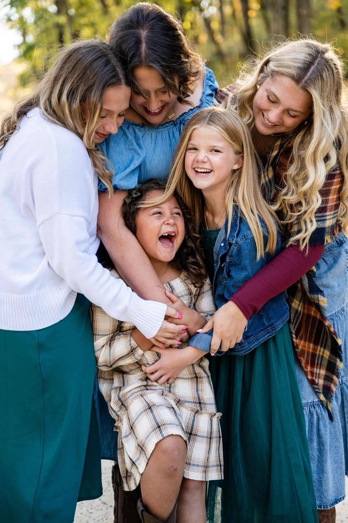 mother-daughters-hugging-tight