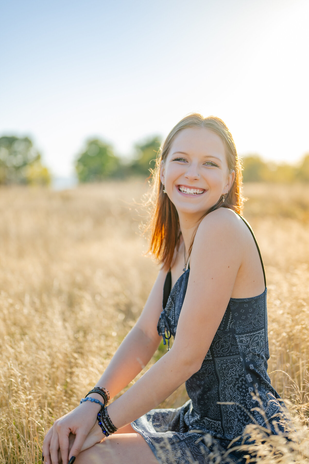 wheat fields summer senior seated