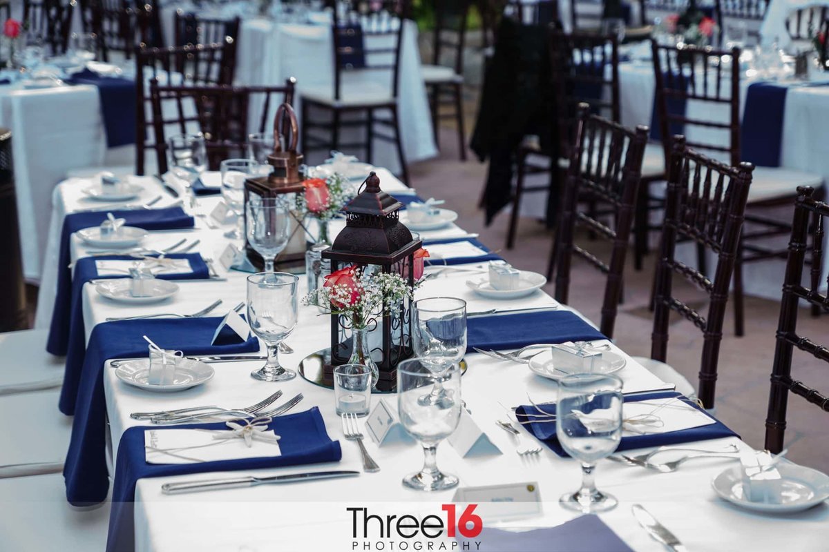 Blue and white table decor for wedding reception