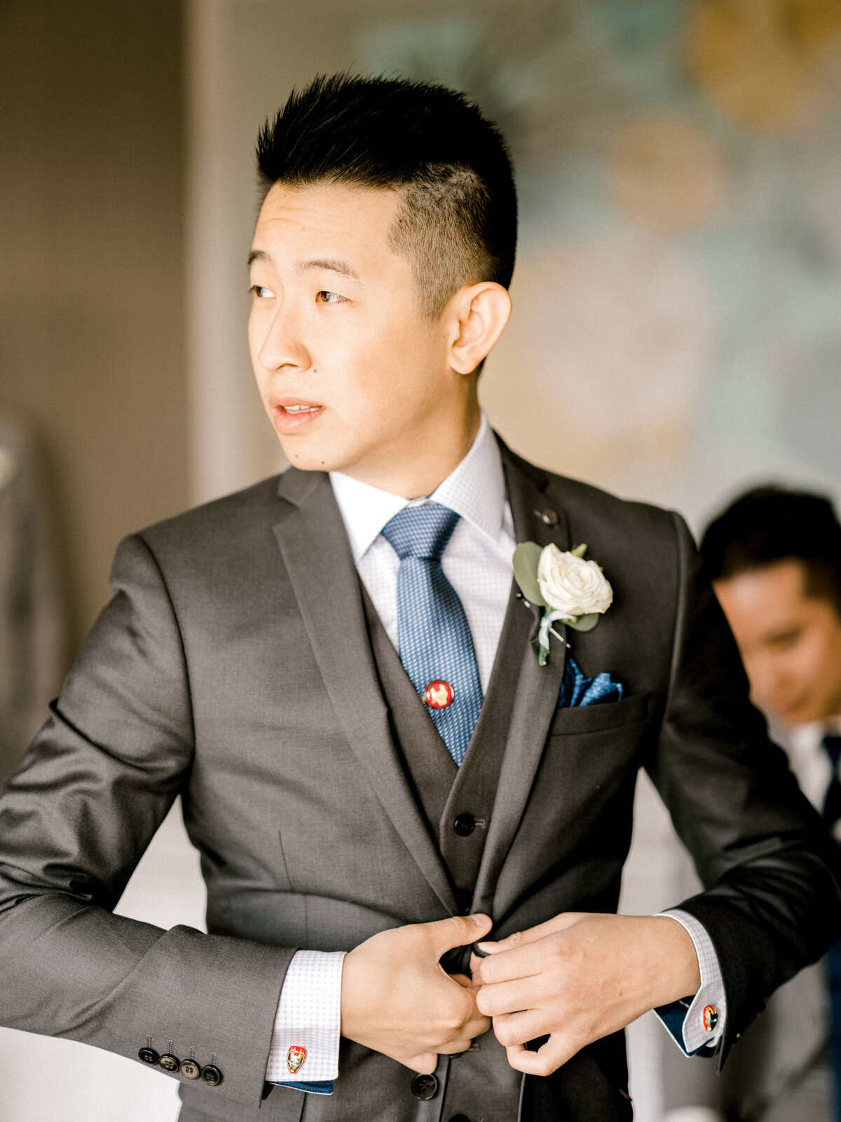 calgary-wedding-groom-getting-ready-suit