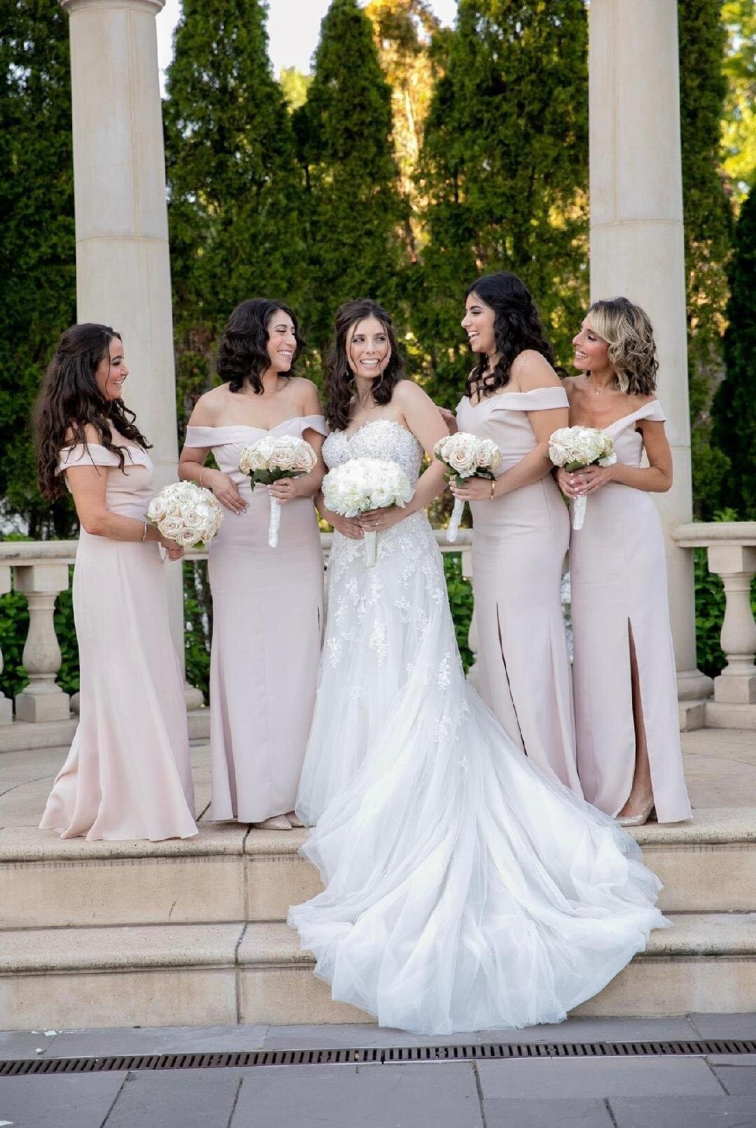 bride with her bridesmaids