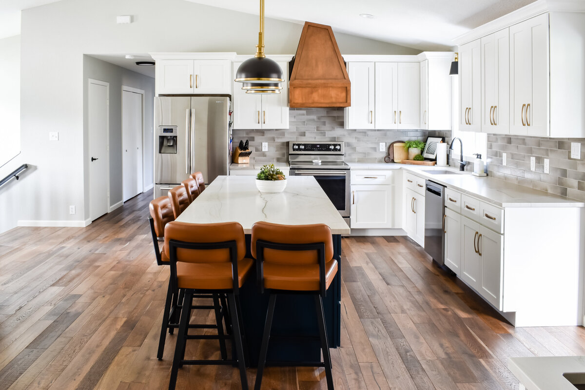A newly remodeled kitchen with an island that seats six people
