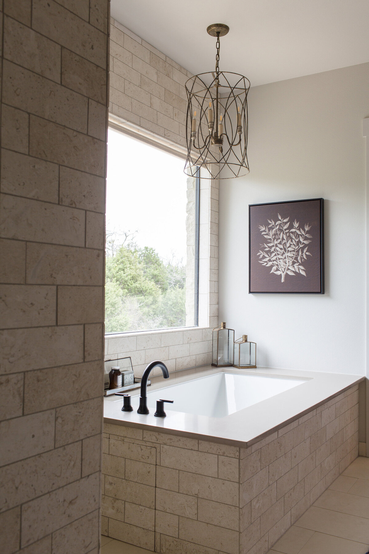 stone bathtub in front of window