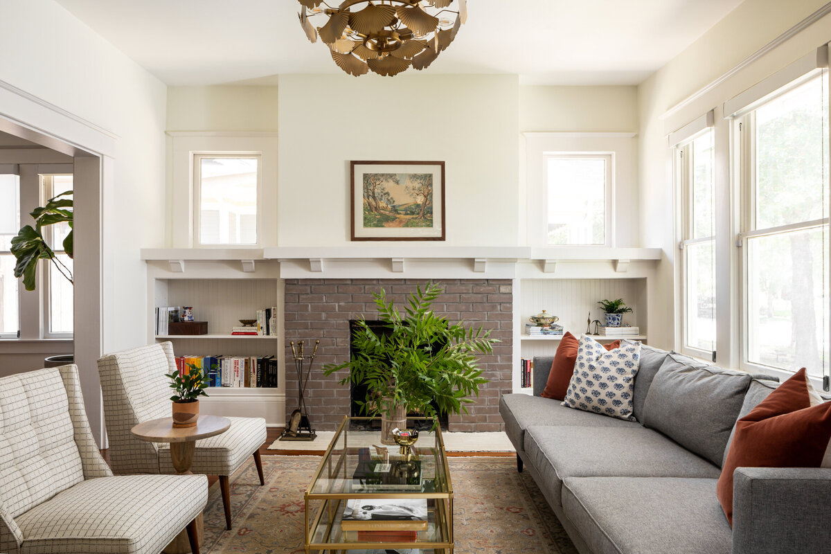 rebekah nicole interiors neutral living room brick fireplace