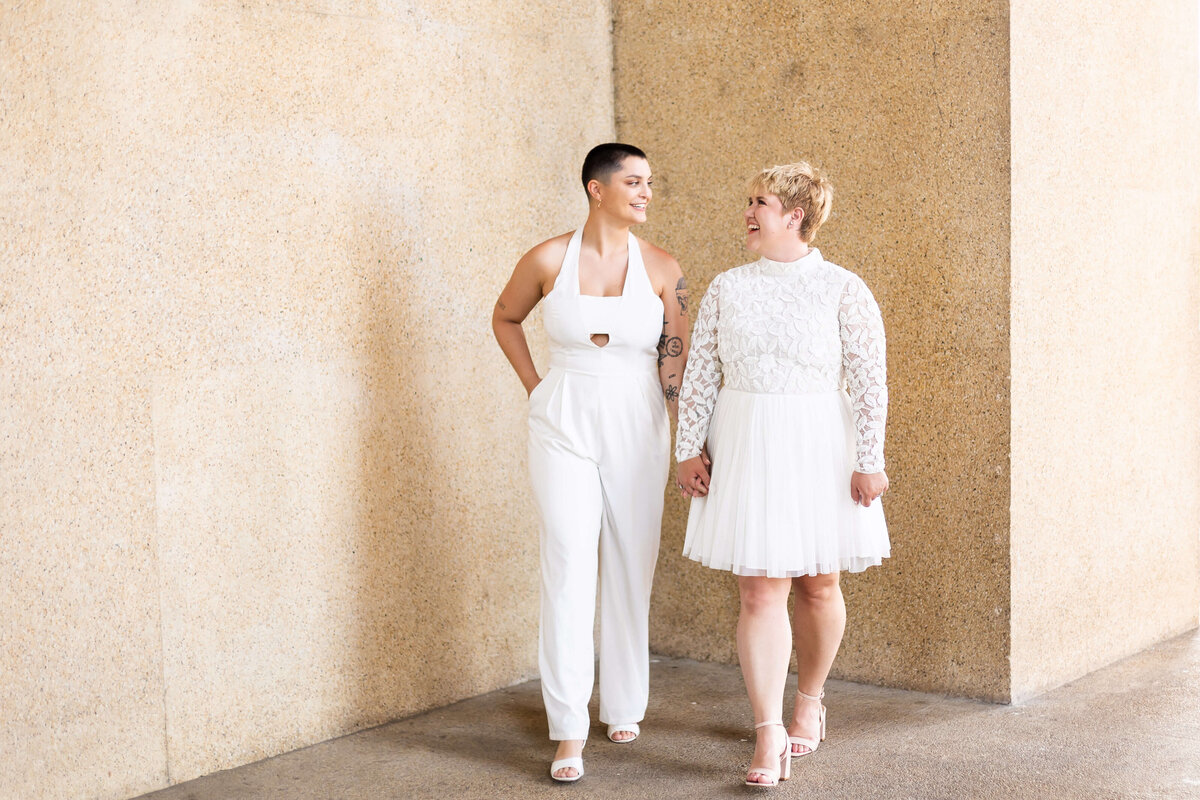 Brides wearing white outfits at LGTBQ wedding in Centennial Park, Nashville,TN