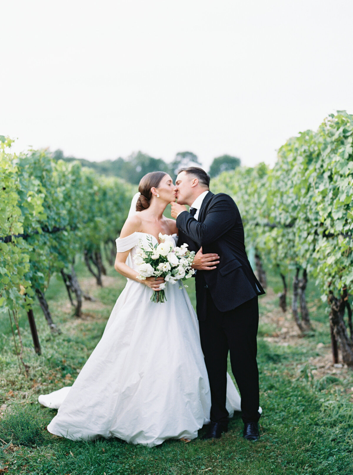 Fine art wedding portraits in vineyard