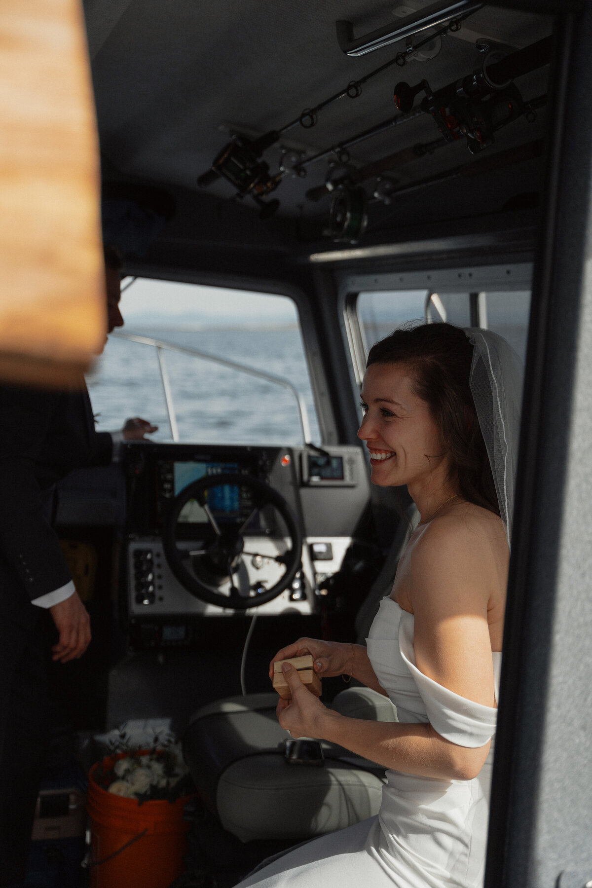 Bride during her sunrise helicopter and boat elopement in the Comox Valley by Latitude 49 Photography