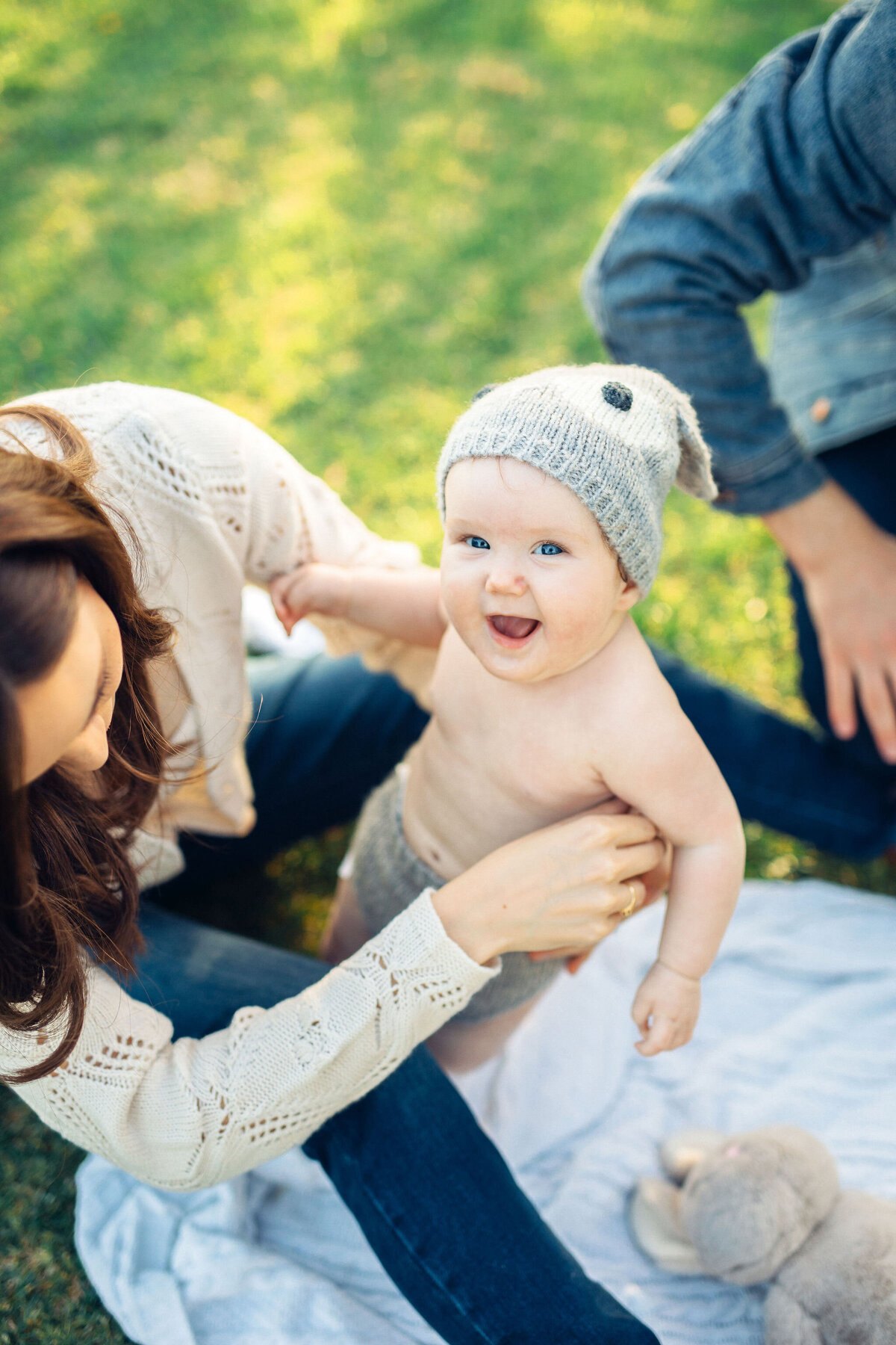 Family Portrait Photo Of Mother Tickling Her Baby  In Los Angeles