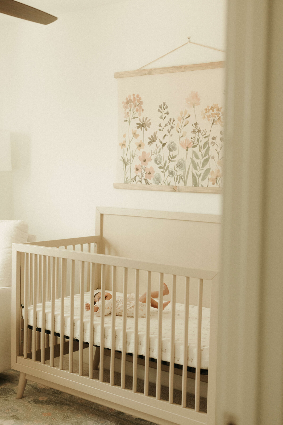 Baby sleeping in Moses basket during Franklin Tennessee lifestyle newborn shoot
