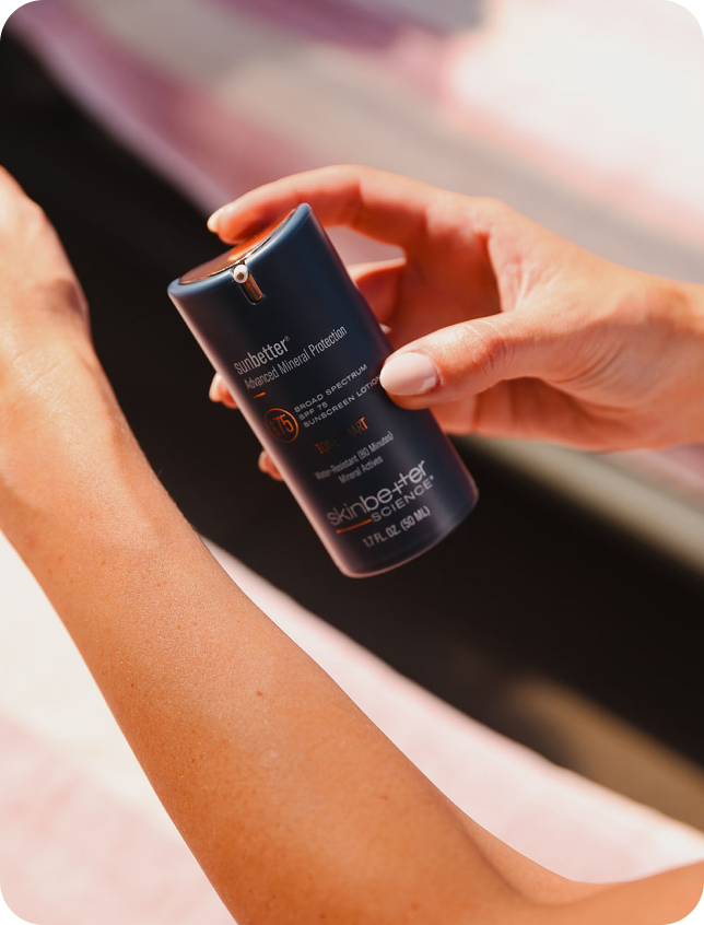 Hand holding a beauty product so that they can better showcase their brand on socials. 