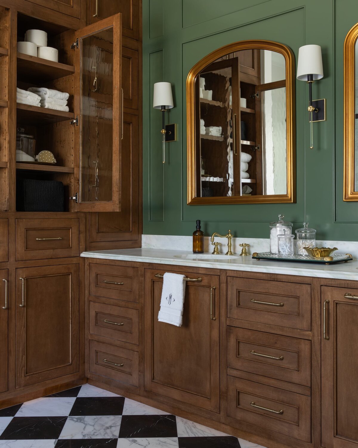 kyleen bushroe interiors coverdell bathroom dark wood vantiy with green painted wall