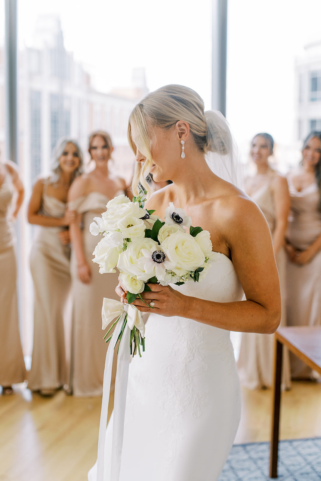 Bride with a white bouquet