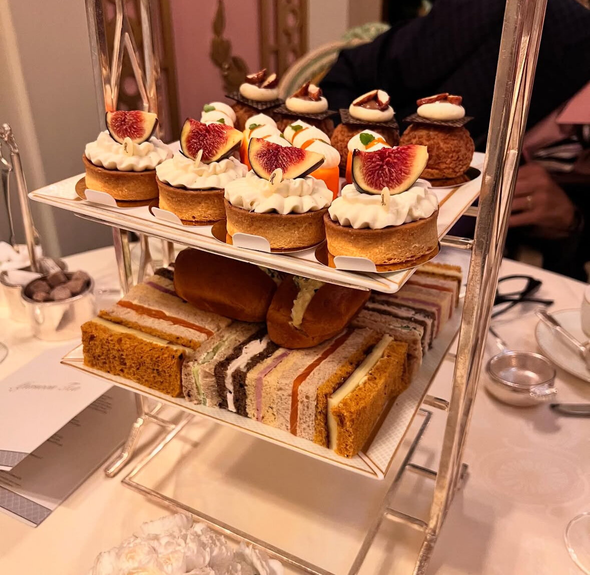 Pastries and desserts on two-tier dessert platter