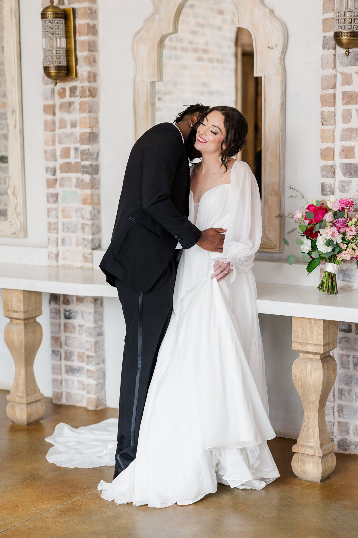 a-sweet-moment-as-the-groom-kisses-his-bride-in-secret