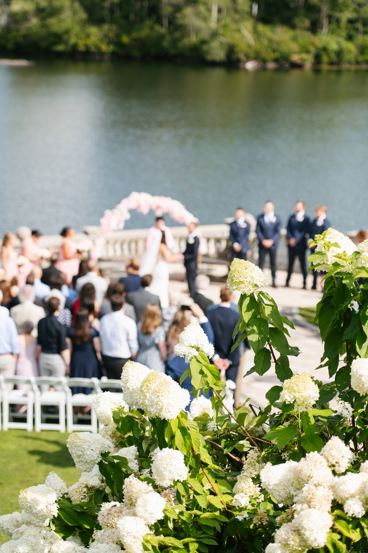 Say 'I do' at Grand View in Mendon, MA. A stunning lakeside wedding venue with breathtaking views, elegant spaces, and timeless photography opportunities