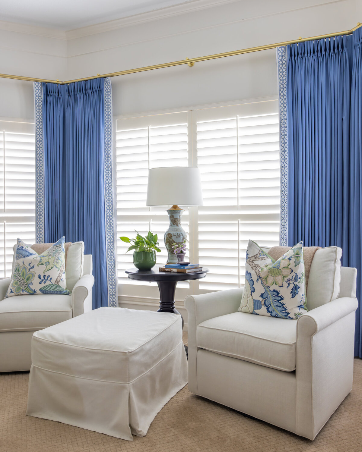 kyleen bushroe interiors blue curtains sitting space white chairs bedroom