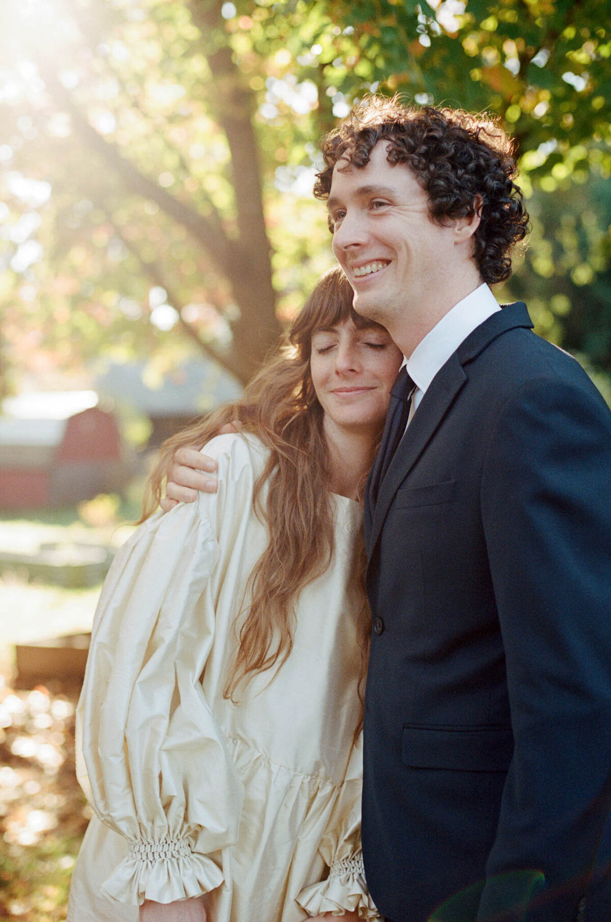 Couple hugging at Mt. Tabor during their intimate portrait session.