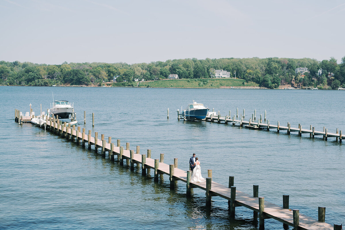 The photo was taken at The Hamptons, New York, waterfront estate tented wedding by photographer Bonnie Sen