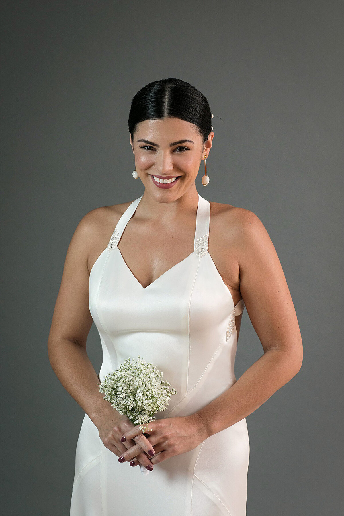 The bodice of the Yuri bridal style features a v-neck and unique seamlines to create the look of a snatched waist.