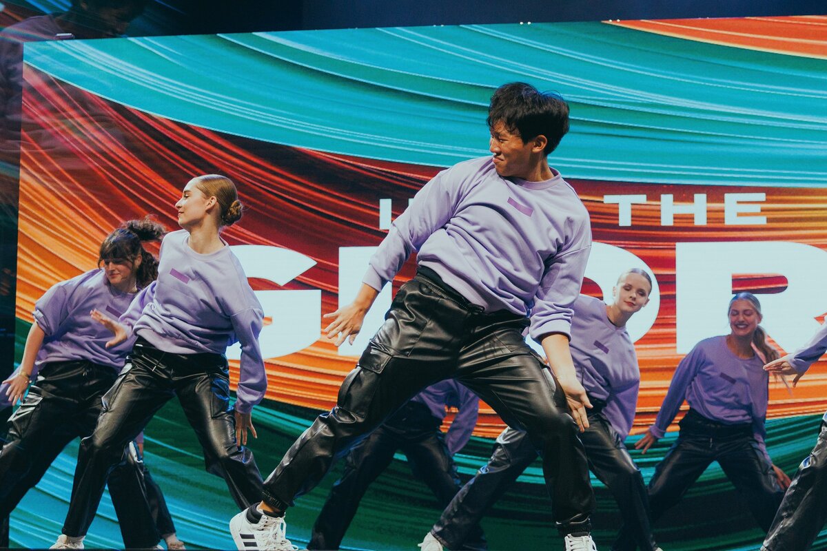 Dancers in white at showcase in Texas
