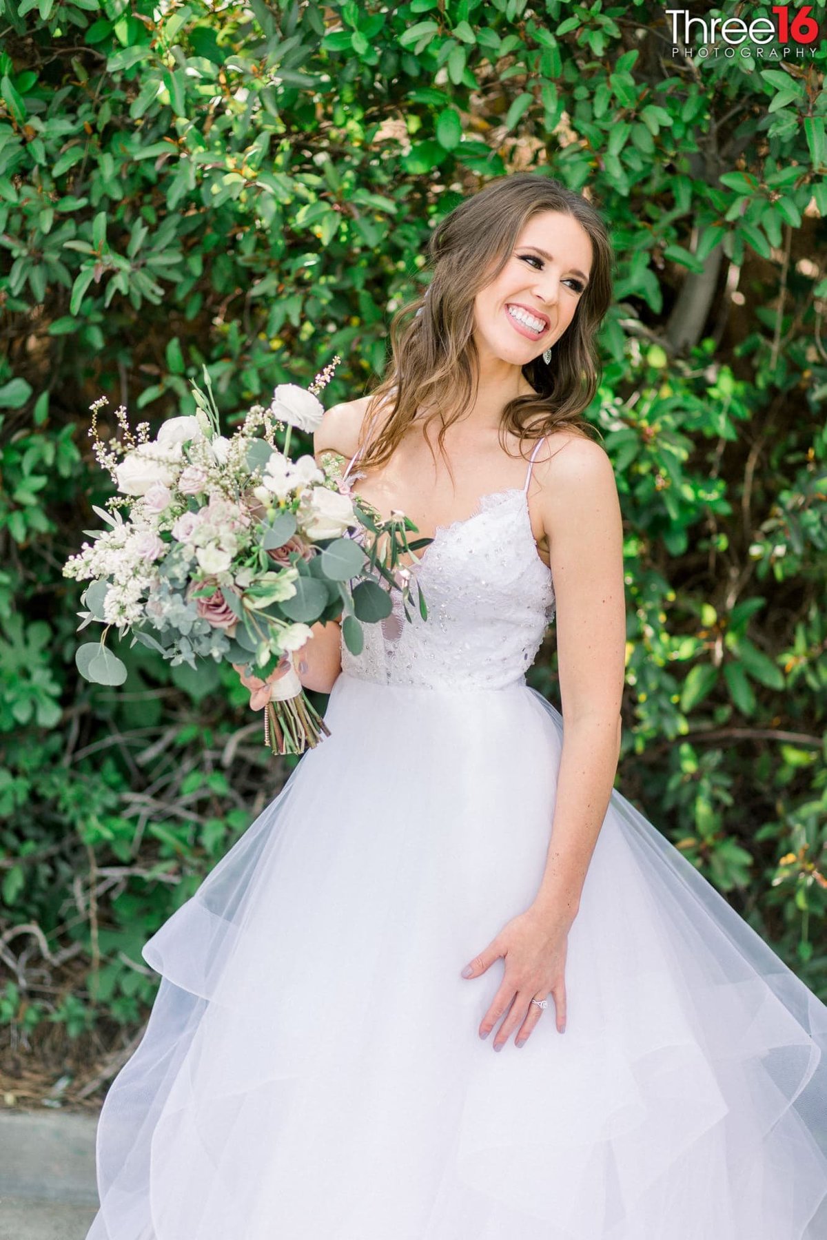 Bride smiles during photo session