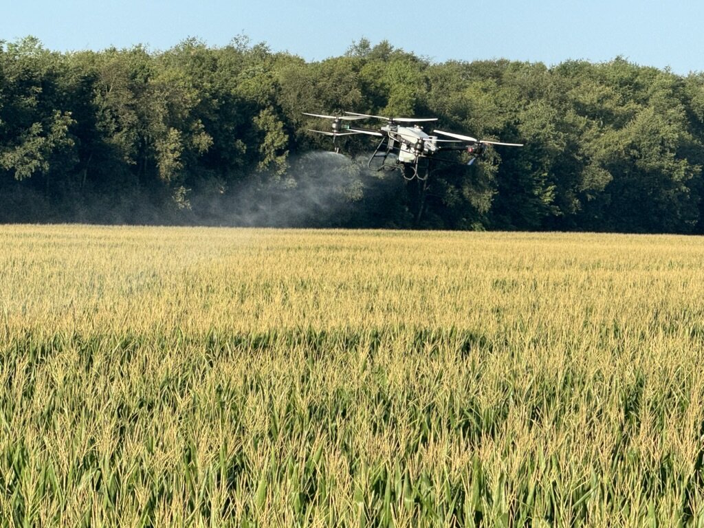 Raven 6 Rising spraying crop fields with drones