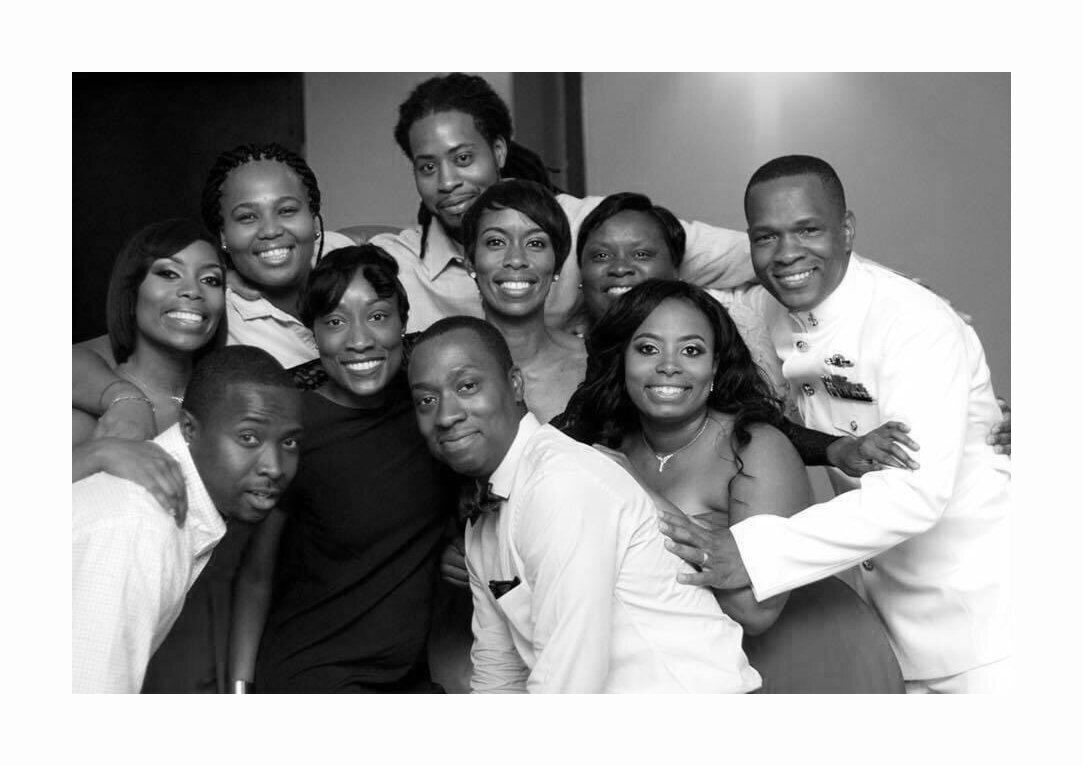 Group of cousins at a black family wedding