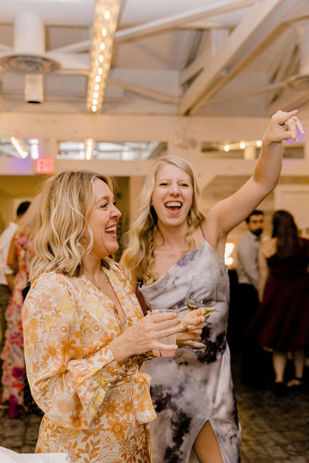Guests dancing at a DC wedding venue during a reception with a live band.