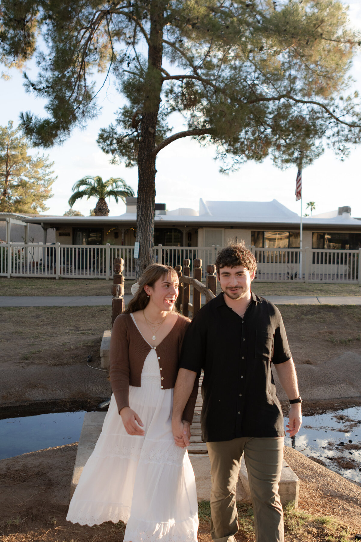 Jovanna G Photography. Classic, sophisticated Wedding Photos. Soft romantic engagement photos. Soft romantic WeddingPhotos. Sophisticated Wedding Photographer. Professional Wedding Photographer. Destination Wedding Photographer. Luxury Wedding photographer. Traveling Wedding Photographer. AZ Wedding Photographer. Gilbert AZ Wedding Photographer. Queen Creek Wedding Photographer. Phoenix Wedding Photographer. Scottsdale Wedding Photographer. Flagstaff Wedding Photographer. SoCal Wedding Photographer. California Wedding Photographer. Northern California Wedding Photographer. Southern California Wedding Photographer. San Francisco Wedding Photographer. Bay Area Wedding Photographer. San Jose Wedding Photographer. Golden Gate Bridge Wedding Photographer. Beach Lover Wedding Photographer. Palace of the Fine Arts Wedding Photographer. Ocean Lover. I love California. Orange County Wedding Photographer. Newport Beach Couples Photographer. Newport Beach Wedding Photographer. Laguna Beach Couples Beach Engagement Photographer. Laguna Beach wedding beach photographer. Los Angeles Wedding Photographer. Young and in love engaged couples who live in southern California. Christian Young Couple. Young Engaged Couple. Engaged High School Christian Couple. Christian Values. Young conservative Christian women. Young Conservative Christian men. Young Conservative Christian Couple. Young Christian Couple Engaged in High School. Young Christian College Couple. Lakeside Lovers in the Autumn Sun. David & Grace - engagement photos. Jovanna G Photographer Engagement Photos. Arizona sun shining through autumn trees- engagement. Chandler, AZ Engagement Photos. Chandler, AZ 2026 bride. Chandler, AZ Wedding Photographer. Chandler, AZ Young Engaged Couple. Girl in her 20s. Engaged Arizona Girl in her 20s. Lakeside Engagement photos. AZ Lakeside Engagement Photos. AZ Weeping Willow Lakeside Proposal. Arizona Lakeside Proposal with weeping willow tree. Detail shot of engagement ring on Arizona Lakeside estate. Chandler, AZ Lakeside Estate Proposal Outfit Inspiration.