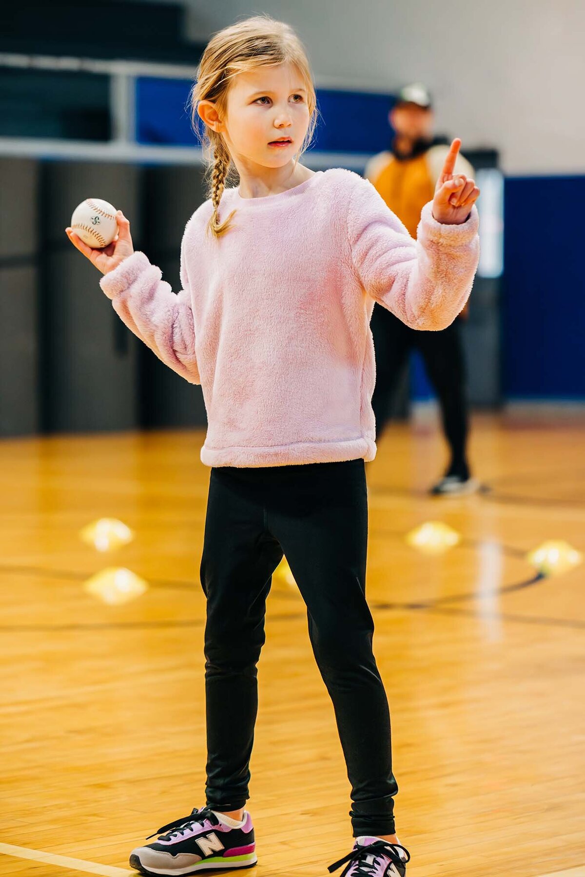 Little girl at tee ball practice