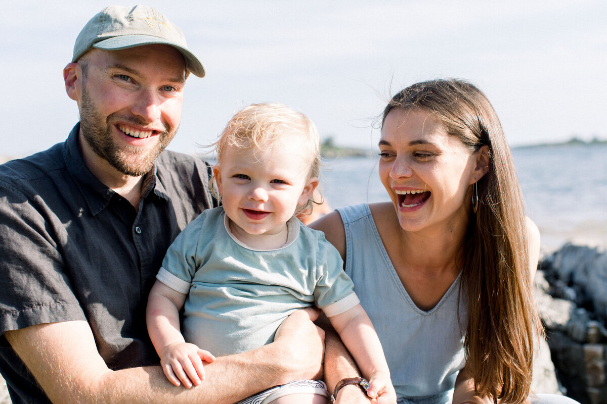couple with baby at new hampshire family photo shoot