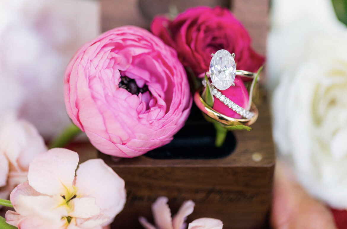 hot-pink-florals-ring-detail-shot-oval-diamond-inspiration-wedding-band-shot-bright-floral-wedding-enza-events