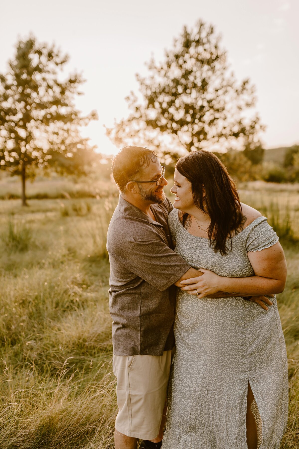 sunset-couple-embrace-nature-session-ada-hayden-heritage-park-ames-iowa-storyteller-collective-photo-co