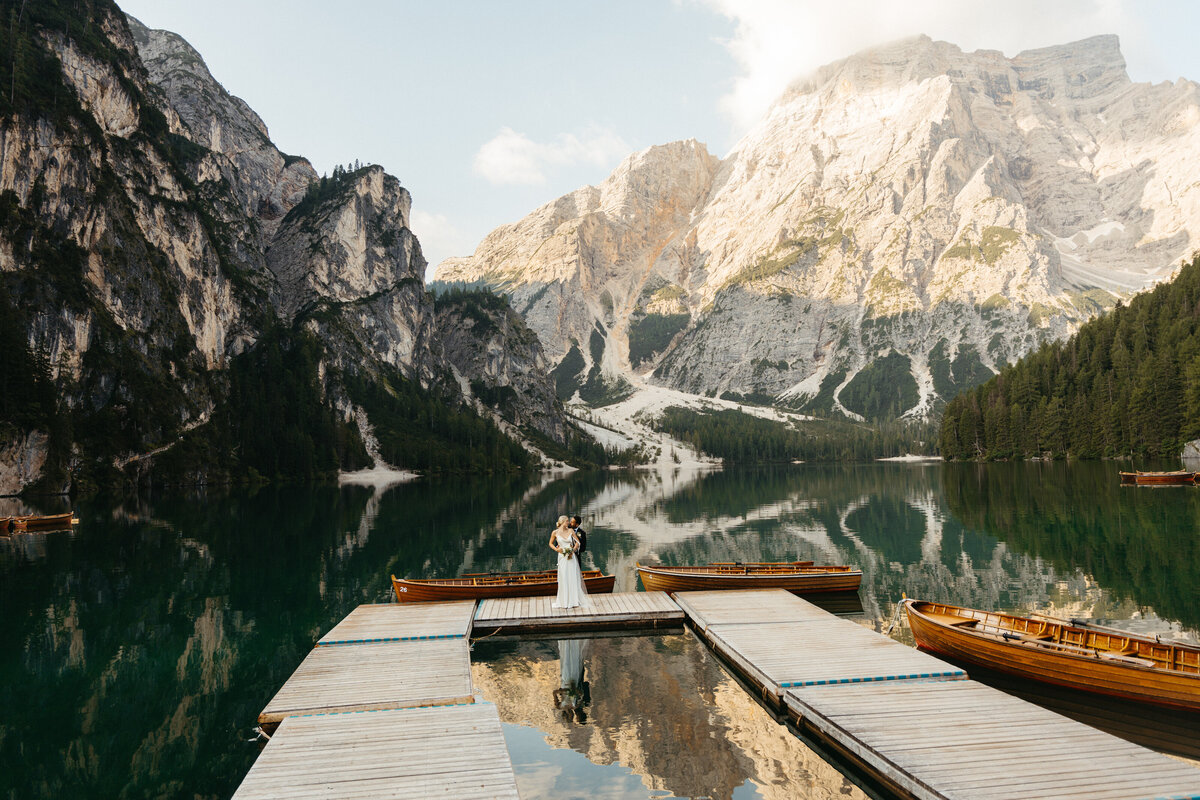 Scenic view of Lago di Braies docks surrounded by mountains